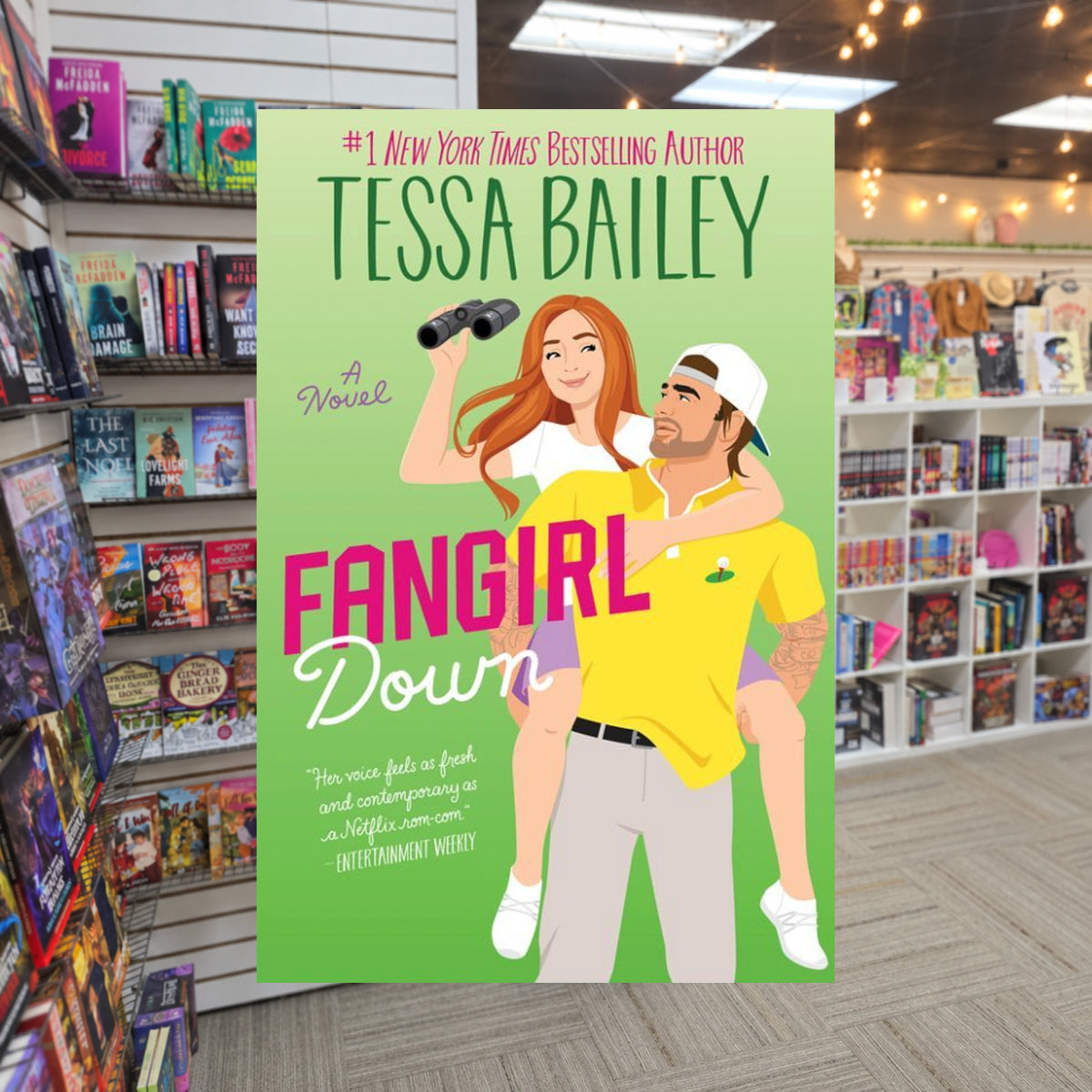 Fangirl Down by Tessa Bailey — actual cover on The Perk bookstore background