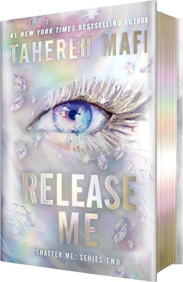 Release Me by Tahereh Mafi Deluxe Limited Edition hardcover featuring a shimmering silver holographic cover with a large blue eye, iridescent details, and holographic page edges. Shatter Me Series Two Book 2.