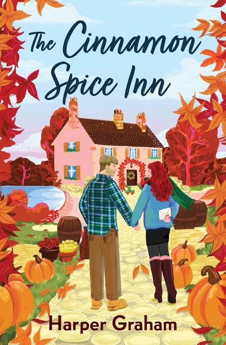 The Cinnamon Spice Inn by Harper Graham paperback cozy autumn romance book cover featuring a couple outside a charming inn surrounded by fall leaves and pumpkins