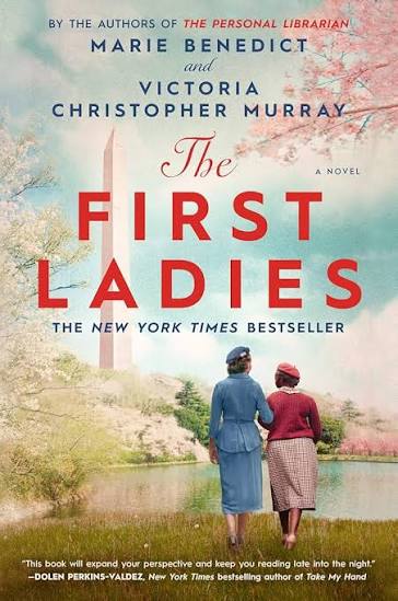 The First Ladies by Marie Benedict and Victoria Christopher Murray historical fiction paperback featuring Eleanor Roosevelt and Mary McLeod Bethune walking together beside a lake with the Washington Monument in the background