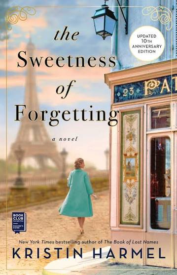 The Sweetness of Forgetting by Kristin Harmel Updated 10th Anniversary Edition paperback book cover featuring a woman in a turquoise coat walking toward the Eiffel Tower in Paris