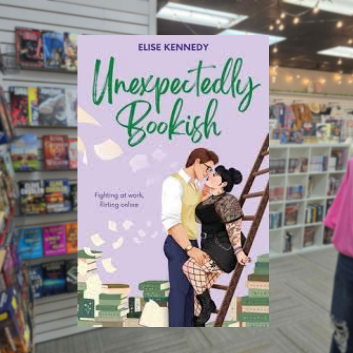 Unexpectedly Bookish by Elise Kennedy contemporary romance book cover featuring an illustrated couple embracing beside a ladder, surrounded by stacks of books against a lavender background.