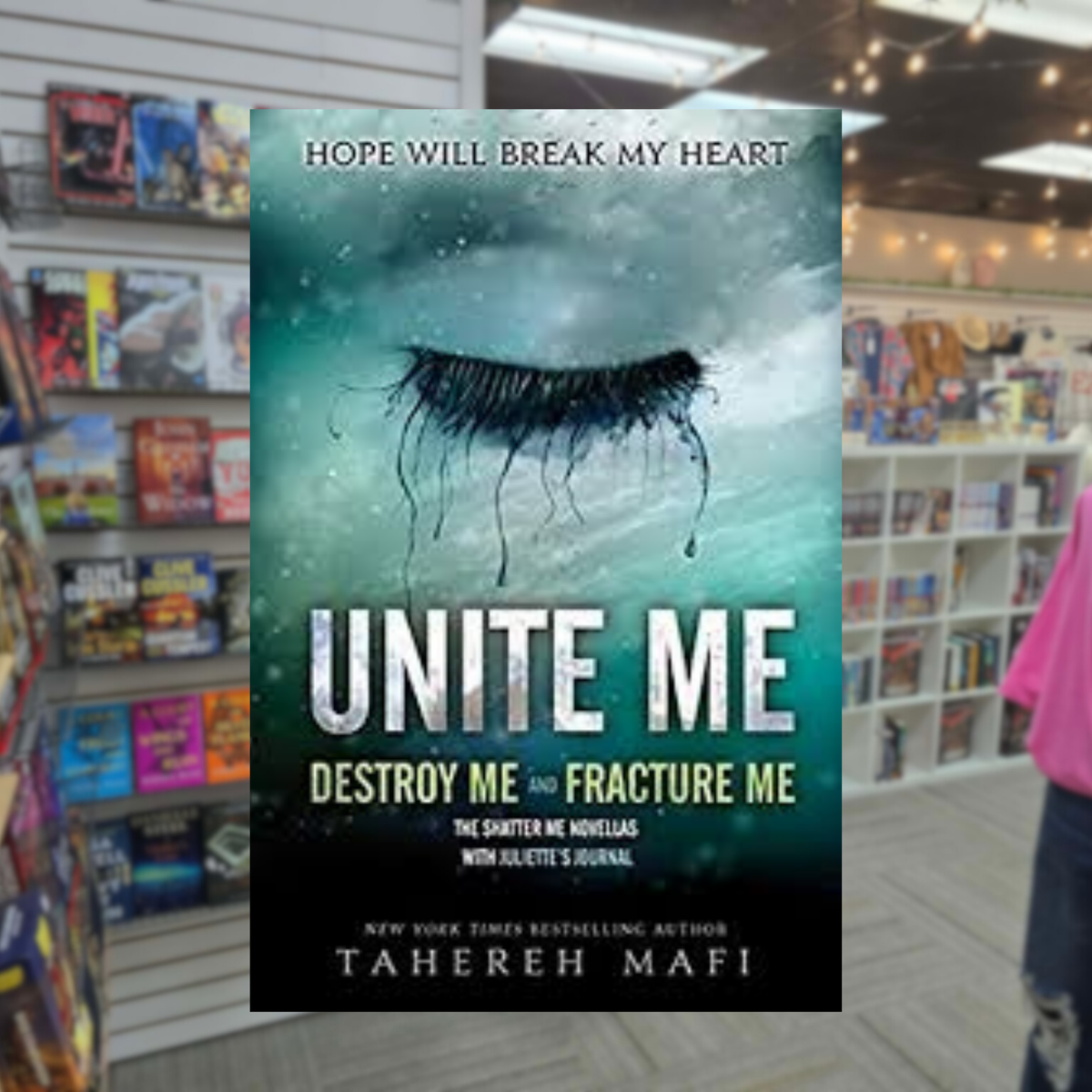 Unite Me by Tahereh Mafi paperback book cover featuring a dramatic illustrated eye with long black eyelashes against a dark teal stormy sky, with white lettering and the titles Destroy Me and Fracture Me.